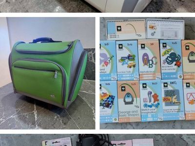 Cricut & Rolling Case + 12 Cartridges & Supplies