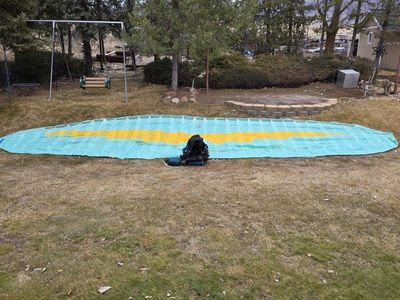 Paragliding wings and harnesses