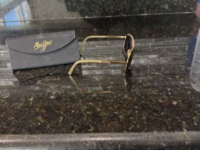 Maui Jims Gold Aviator Sunglasses with Black Lenses and Original Case