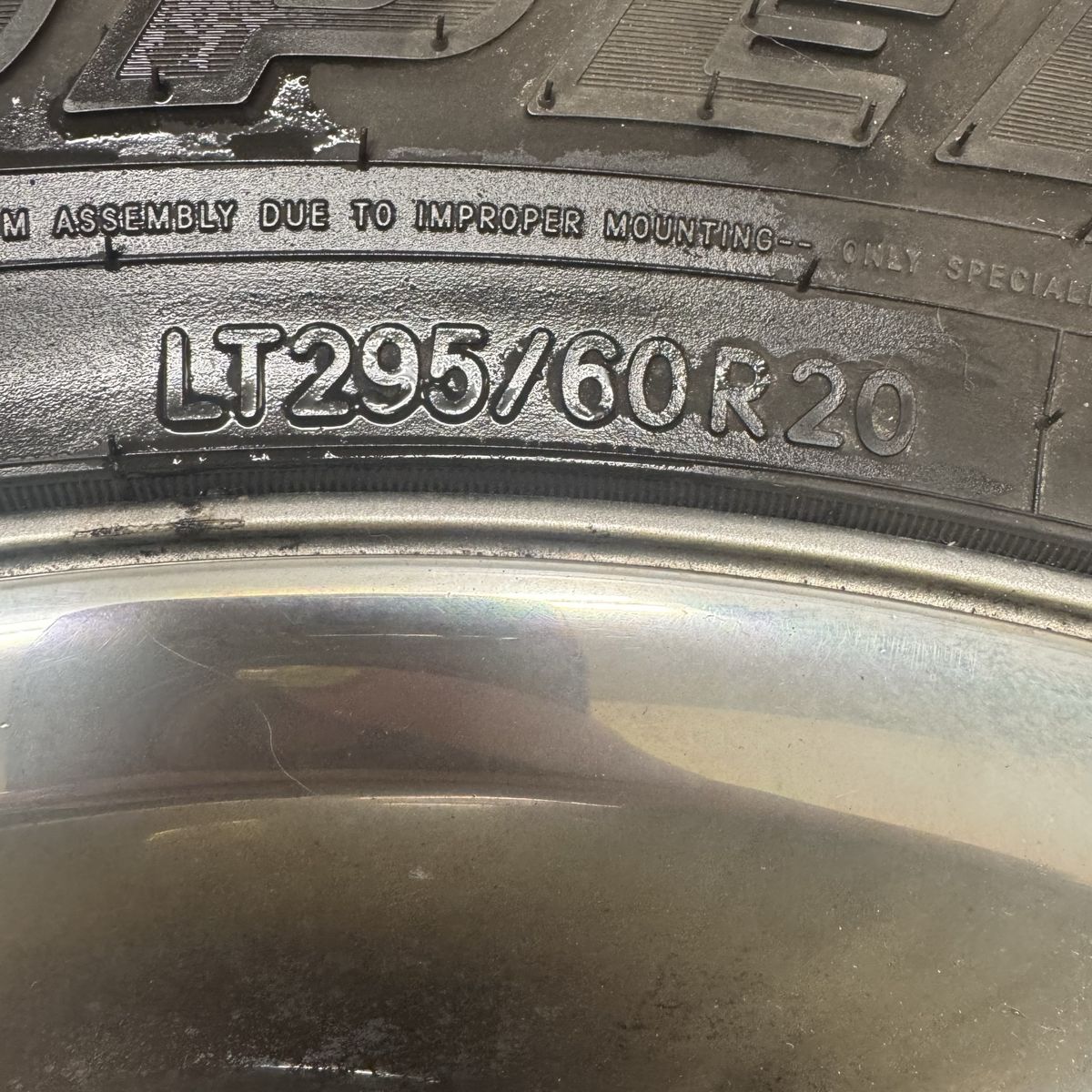 Toyo Open Country A/T LT295/60R20 Tires on Chrome Dodge Wheels