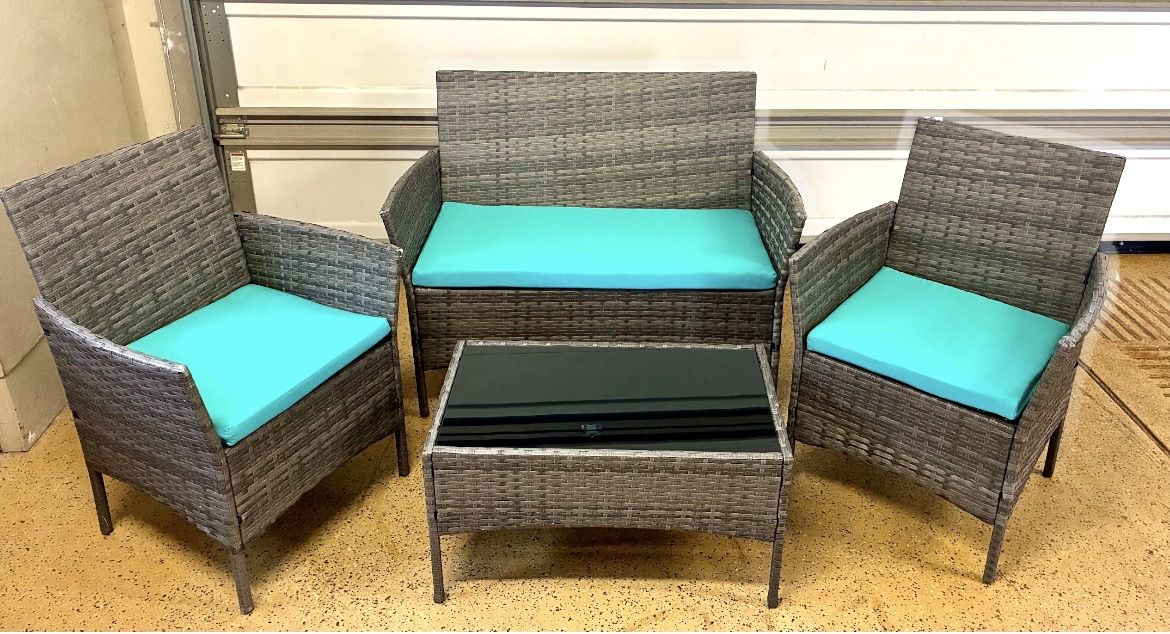 4-Piece Outdoor Wicker Patio Furniture Set with Teal Cushions and Glass Top Coffee Table