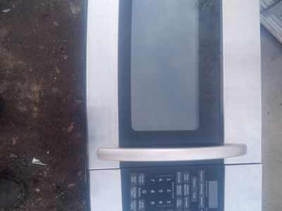 Title:GE Stainless Over-the-Range Microwave – Clea