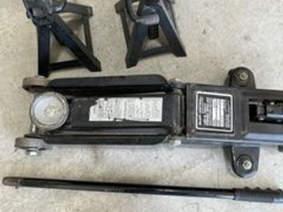 5000 lb. capacity Craftsman floor jack and pair of jack stands.