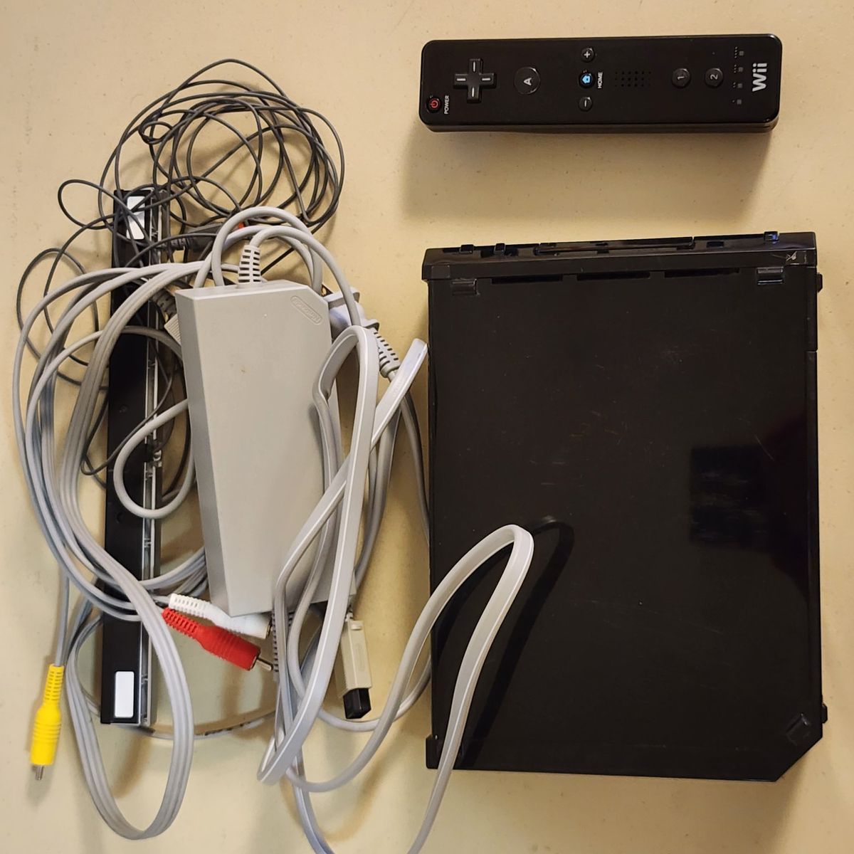 Nintendo Wii Console Black with Remote, Power Supply, AV Cables, and Sensor Bar
