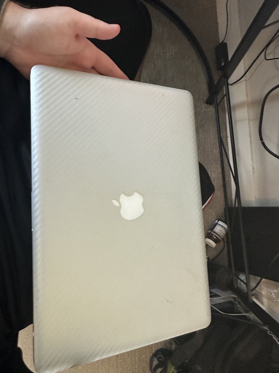 Apple MacBook with Charger (Used, Silver Carbon Fiber Skin)
