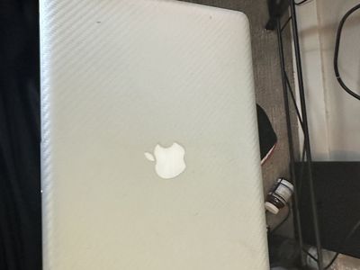 Apple MacBook with Charger (Used, Silver Carbon Fiber Skin)