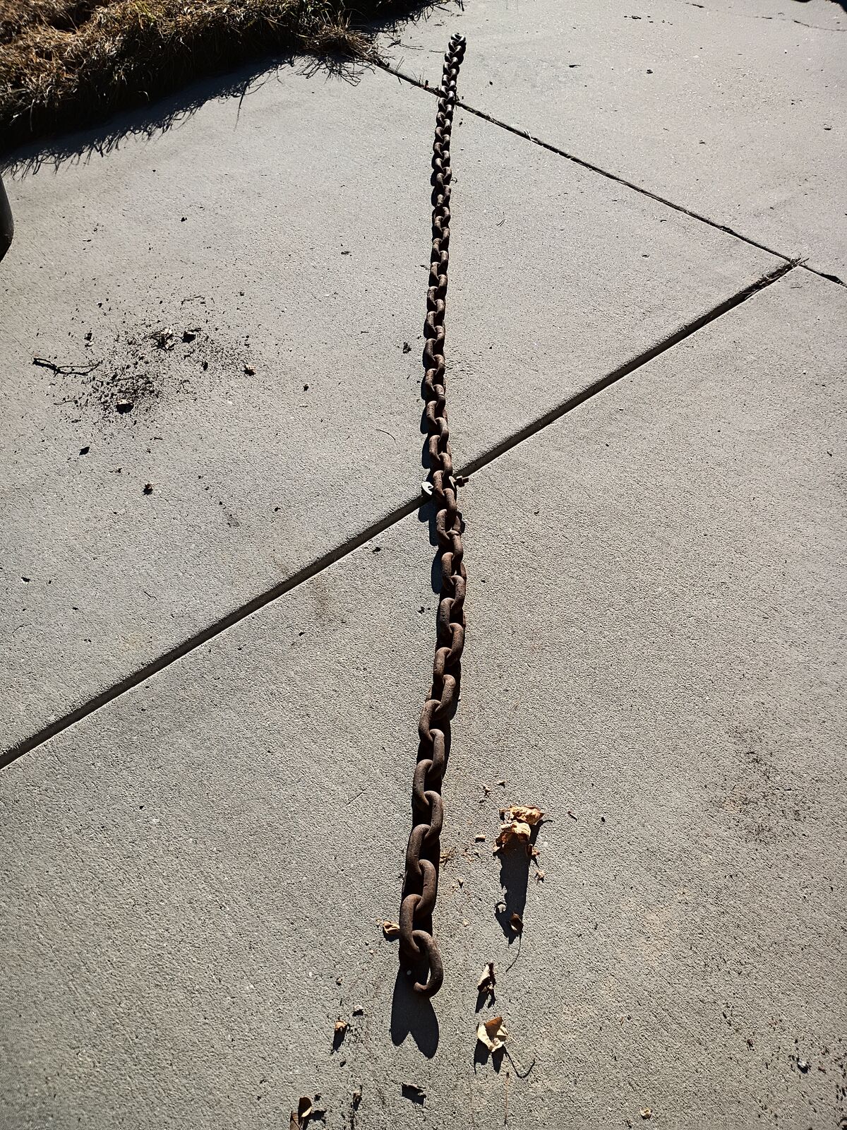 Chain. 10- 1/2 feet long. 3 inch links.