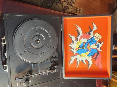 NECA "Superman" vinyl record turntable. Works great. Can connect to a receiver or has built in speakers.