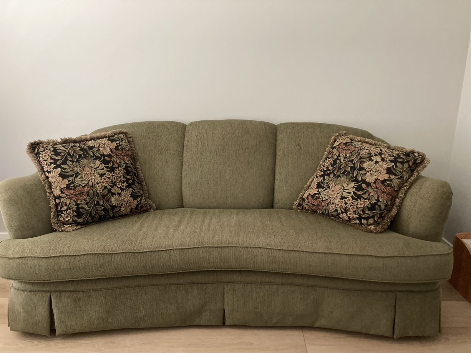 Green Sofa with pillows