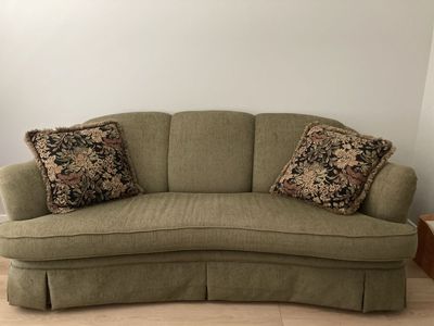 Green Sofa with pillows