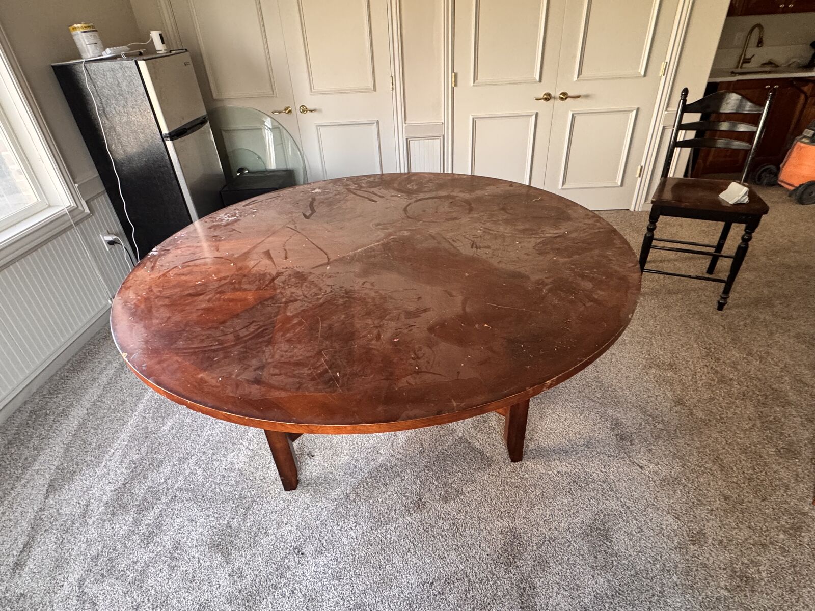 Two 6 ft round craft tables with 10 chairs.