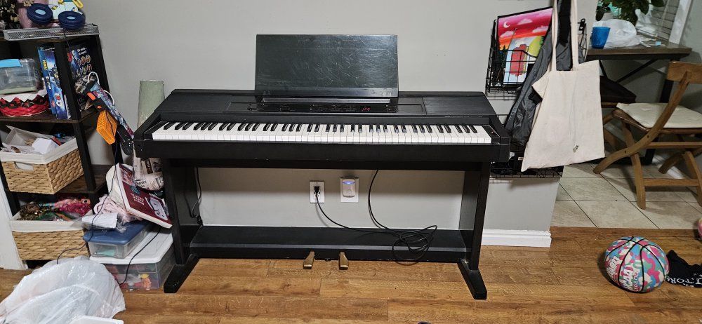 Yamaha Clavinova CLP-100 Digital Piano - 88 Weighted Keys, Black Finish, with Bench