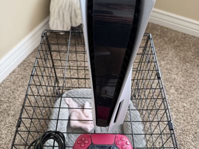 Sony PlayStation 5 Console with Pink Controller and Power Cable