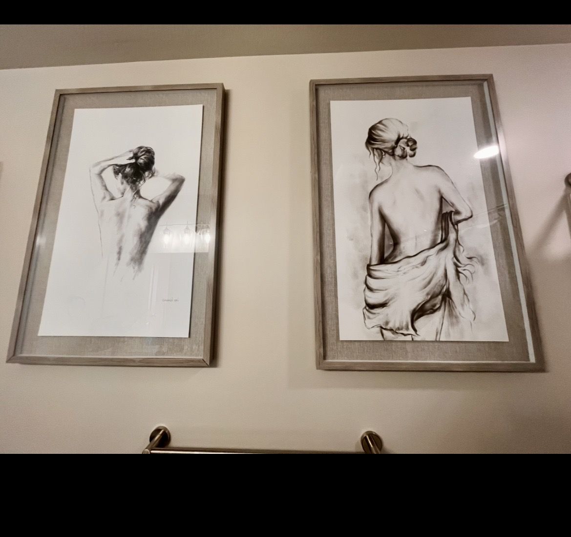 Two portraits in gray frame