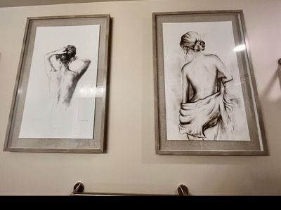 Two portraits in gray frame