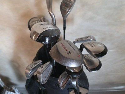 Assortment of Clubs and Bag