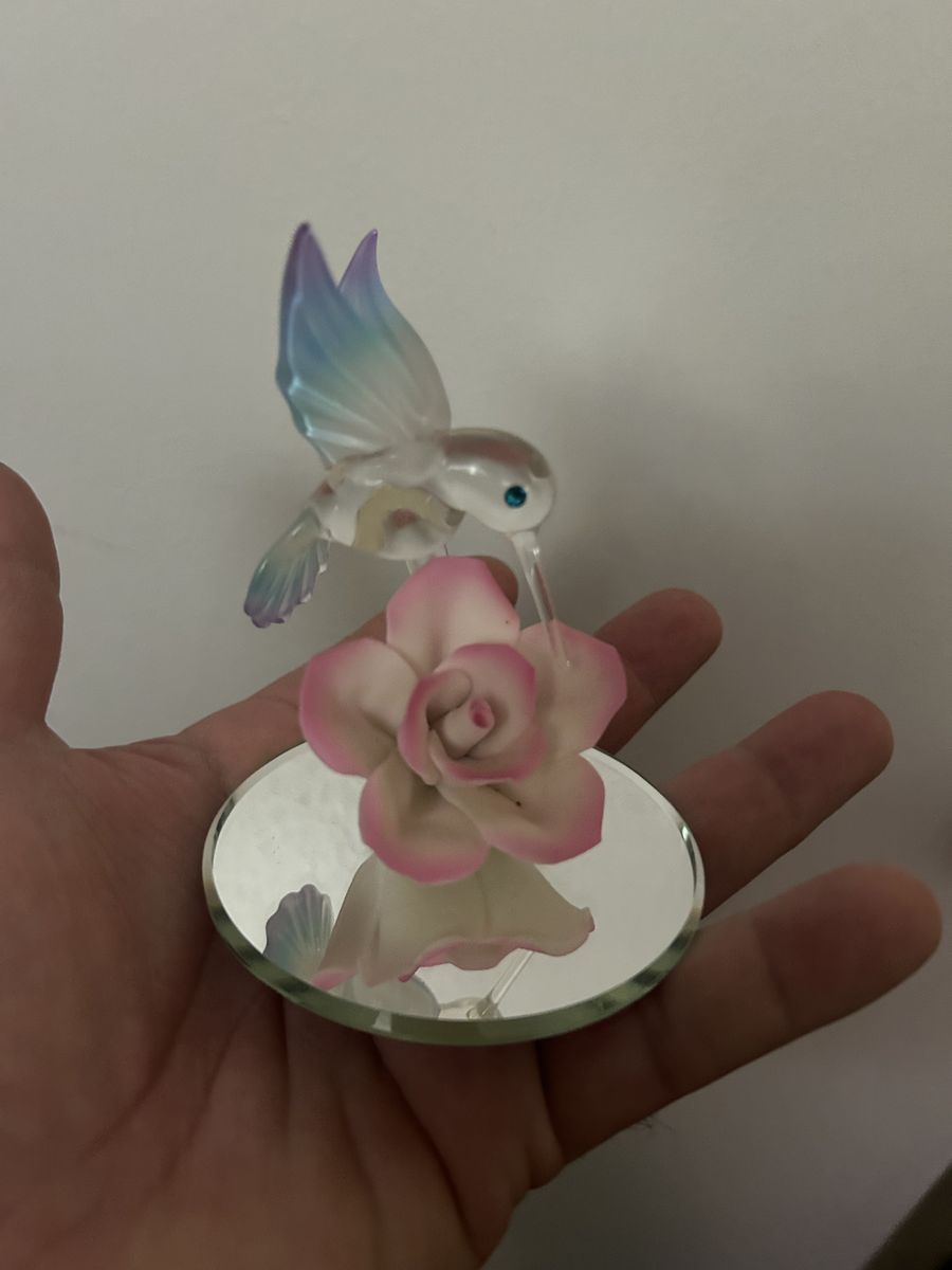 Hummingbird with pink rose