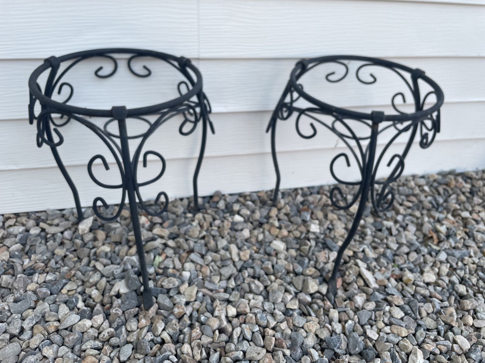 2 matching iron plant stands