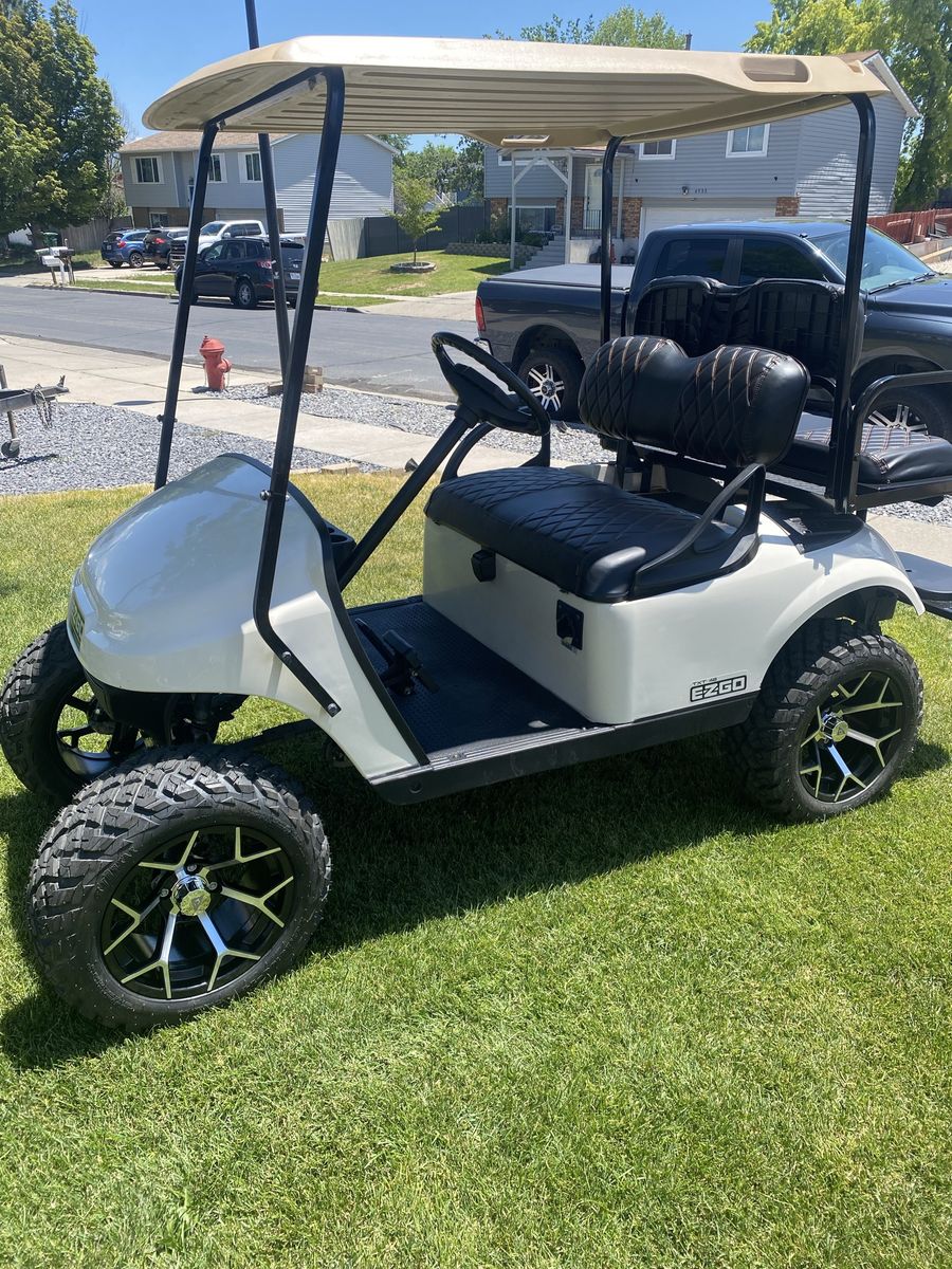 EZGO Lifted Golf Cart - White, Custom Wheels & Tires, Black Seats