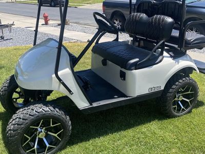 EZGO Lifted Golf Cart - White, Custom Wheels & Tires, Black Seats