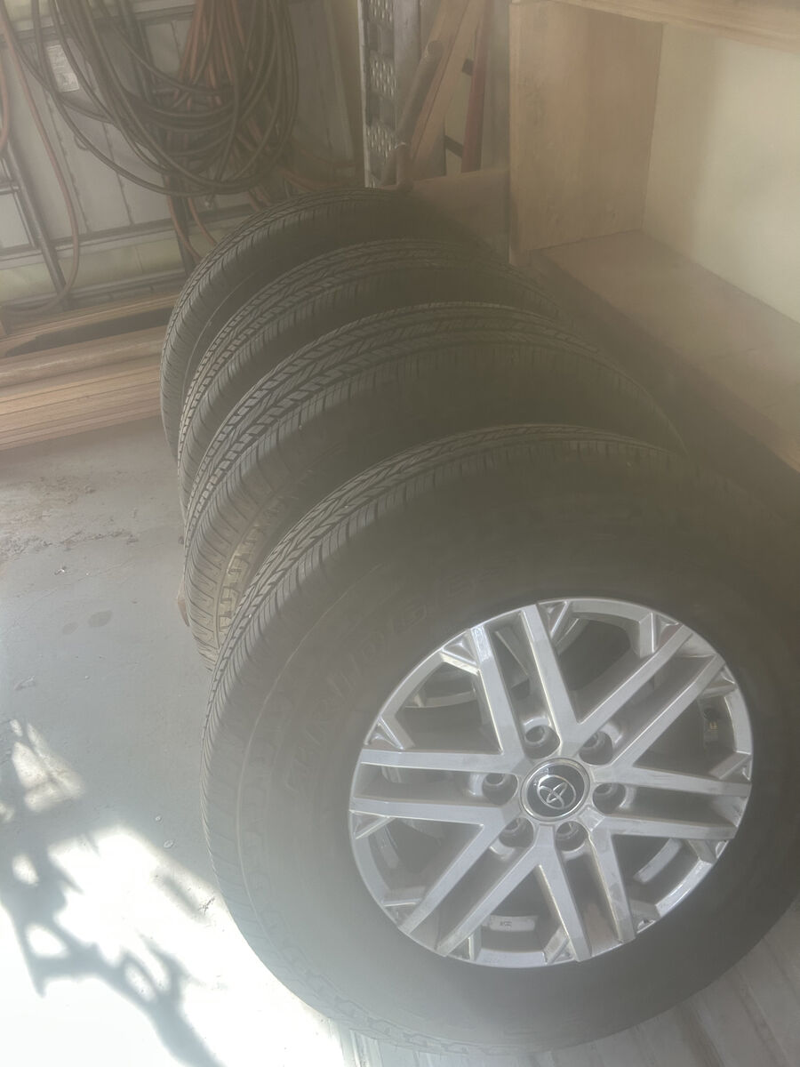 265/70/18 Bridgestone tires and Tundra rims