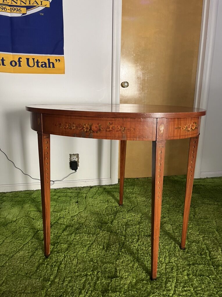 antique mahogany demi-lune card table.