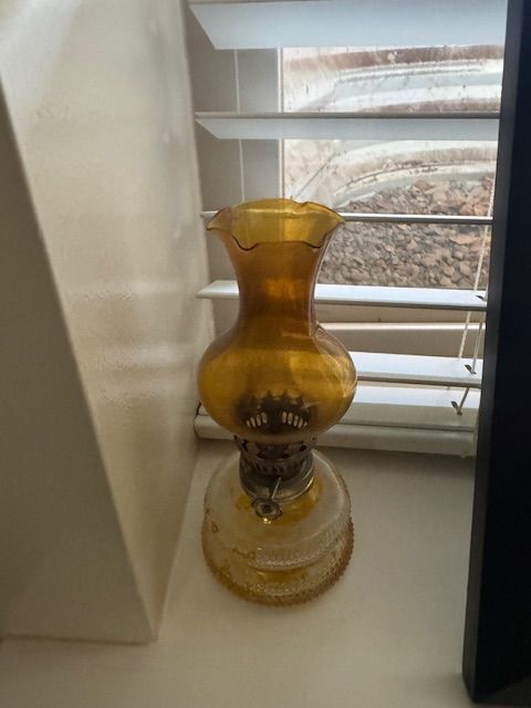 small antique oil lamp