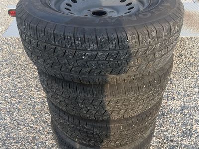 Set of 4 National Commando LT265/70R17 Tires on 17x7.5 Steel Wheels