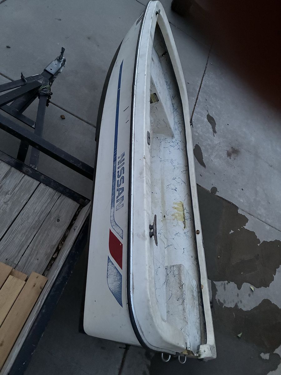 Nissan 8ft fishing boat.