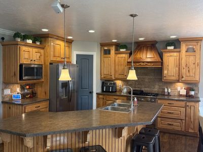 Anvil Cabinets Custom Solid Knotty Maple Kitchen Cabinet Set with Island & Hood