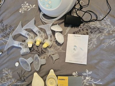 Spectra pump with Madela parts and adapter