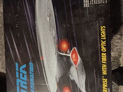 star trek models and collector's metal plate