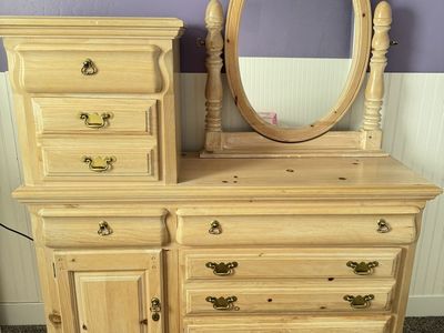 Vintage Solid Wood Dresser with Attached Oval Mirror and Multiple Drawers