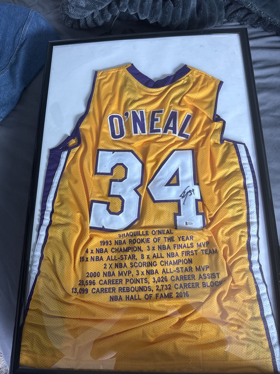 Beckett authenticated signed framed Shaq jersey
