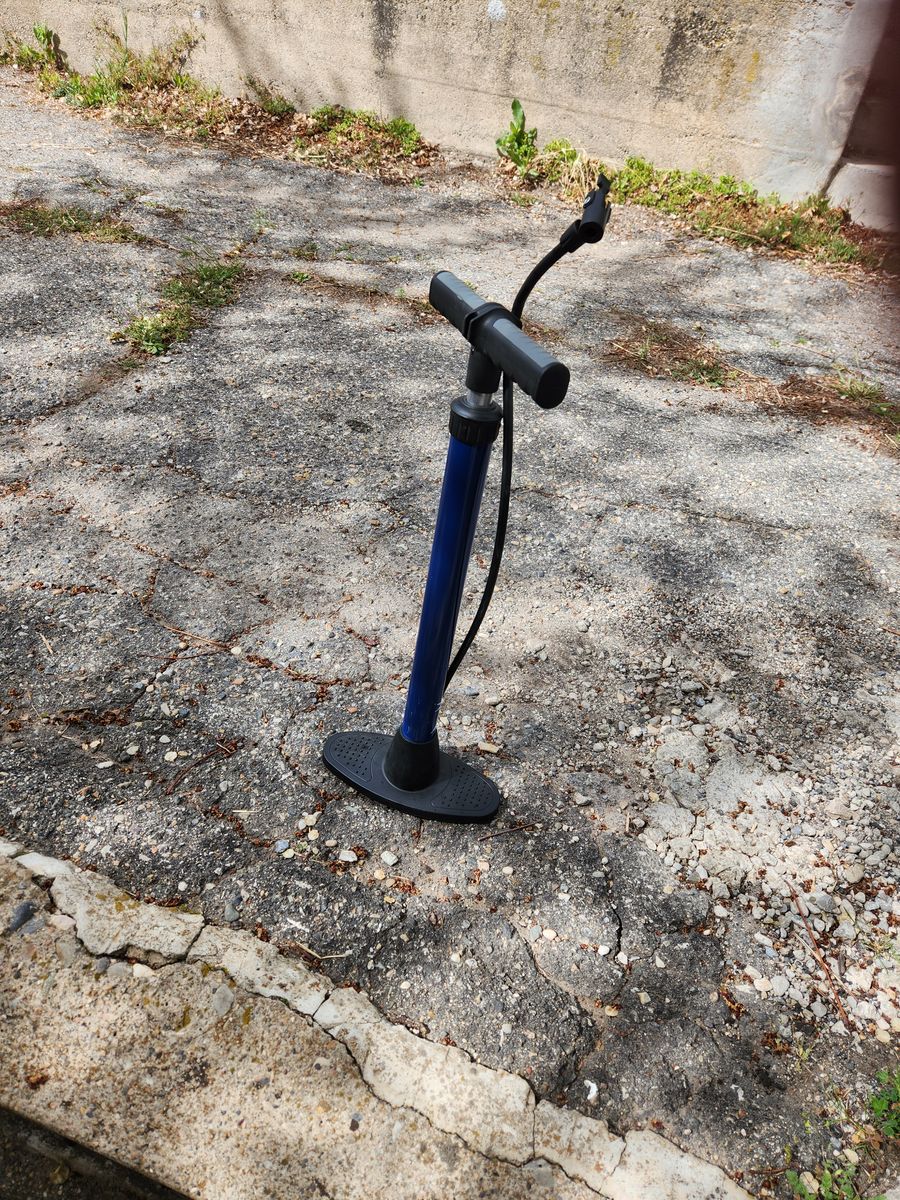 Standard bike pump.  Works great.