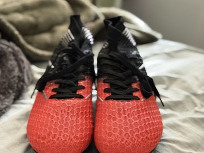 Orange and black cleats dreampair