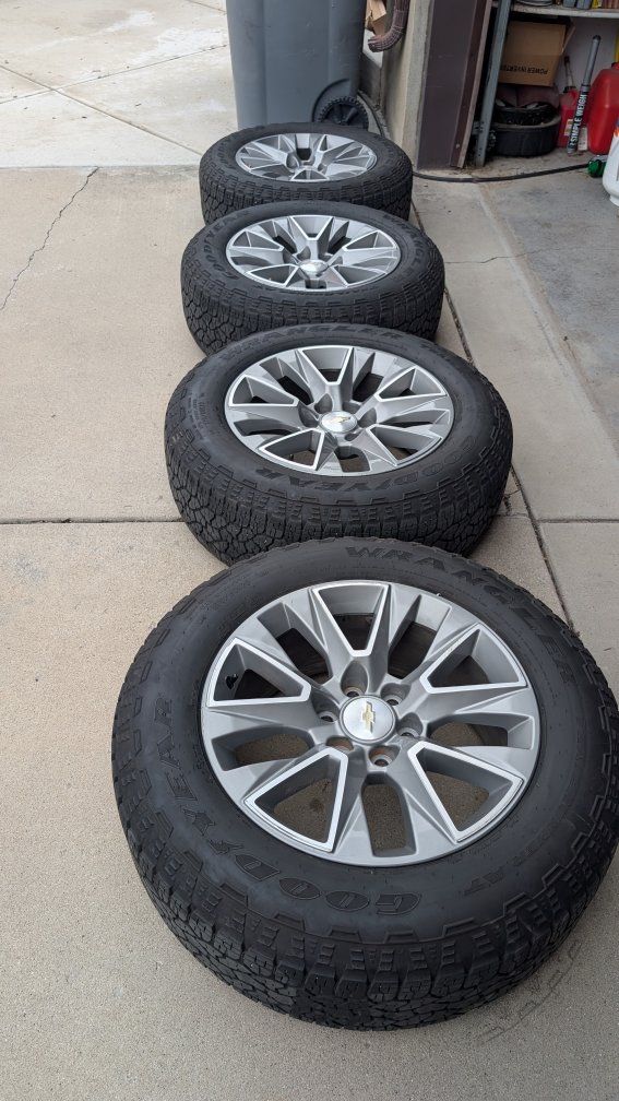 Set of 4 Chevrolet Silverado High Country OEM Wheels with Goodyear Wrangler Tires