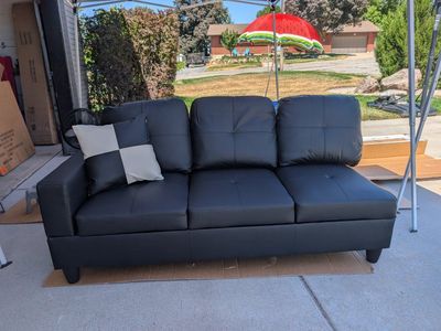 Modern Black Faux Leather Sectional Sofa with Throw Pillow