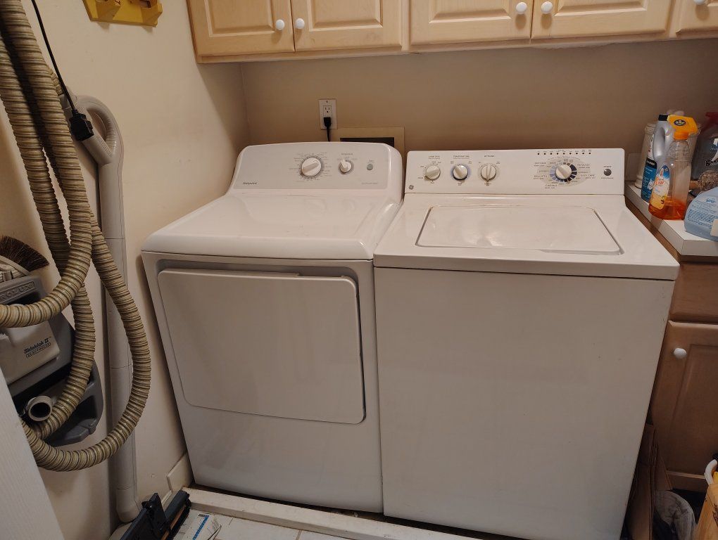 Top load washer and accompanying dryer.