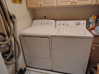 Top load washer and accompanying dryer.