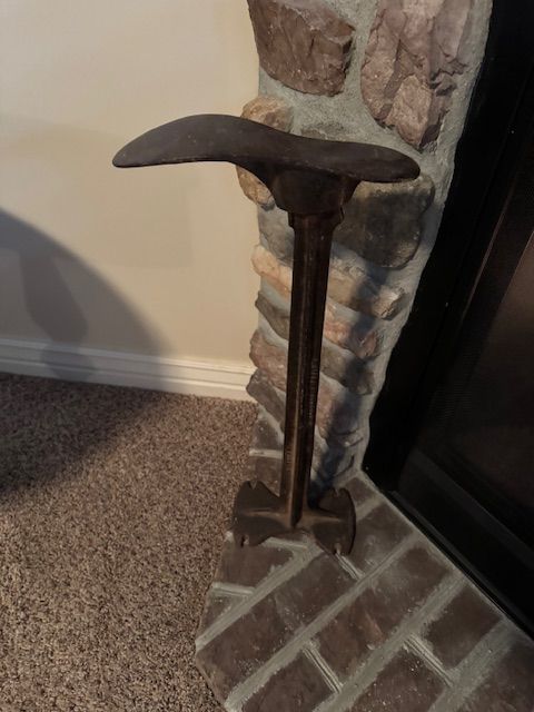 vintage cobbler’s shoe last stand