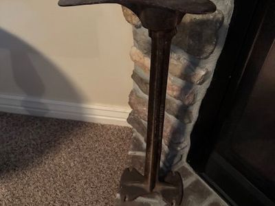 vintage cobbler’s shoe last stand
