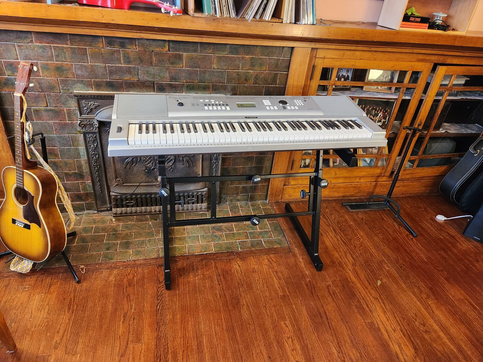 Yamaha Portable Grand Piano DGX-230 with stand and pedal.  Works great.