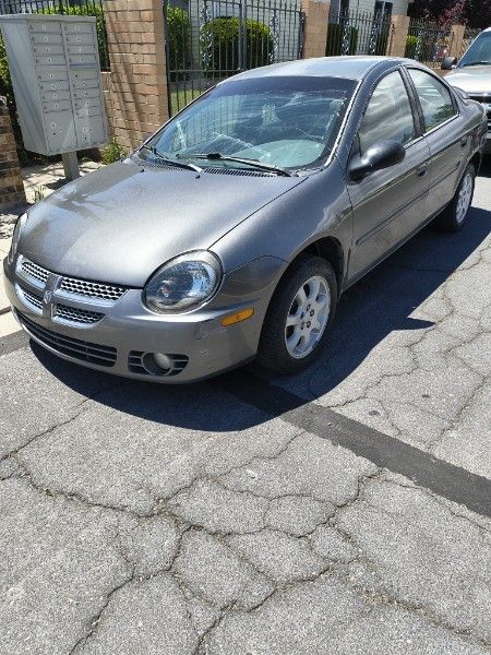 Two Dodge Neon Project Cars with Extra set of wheels/Tires/Parts