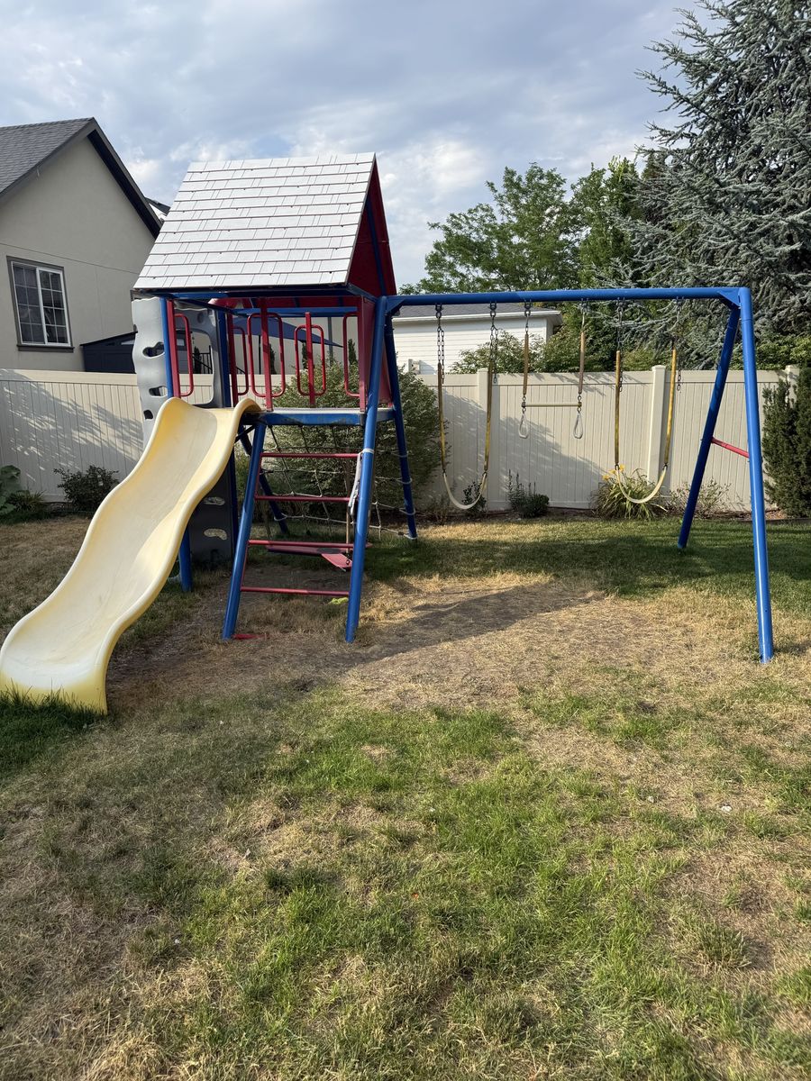 Used Outdoor Kids Playset with Slide, Swings, and Climbing Wall - Red, Blue, and White