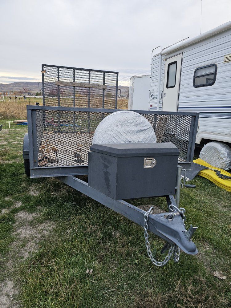 Single Axle Utility Trailer with Rear Ramp Gate, Tool Box, and Spare Tire