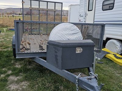 Single Axle Utility Trailer with Rear Ramp Gate, Tool Box, and Spare Tire