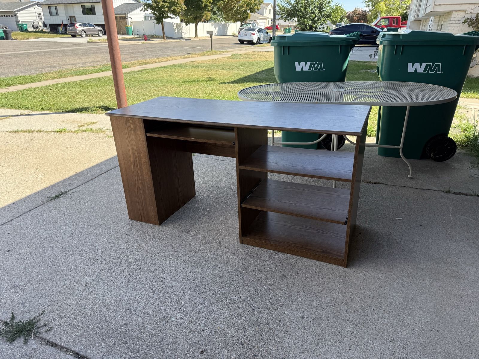 Dark Wood Laminate Computer Desk with Integrated Shelving and Keyboard Tray