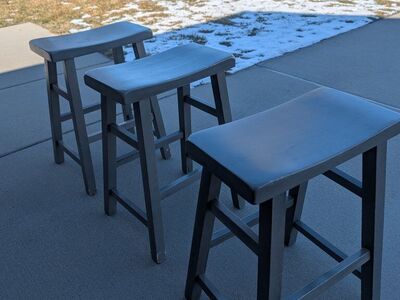 3 gray kitchen stools