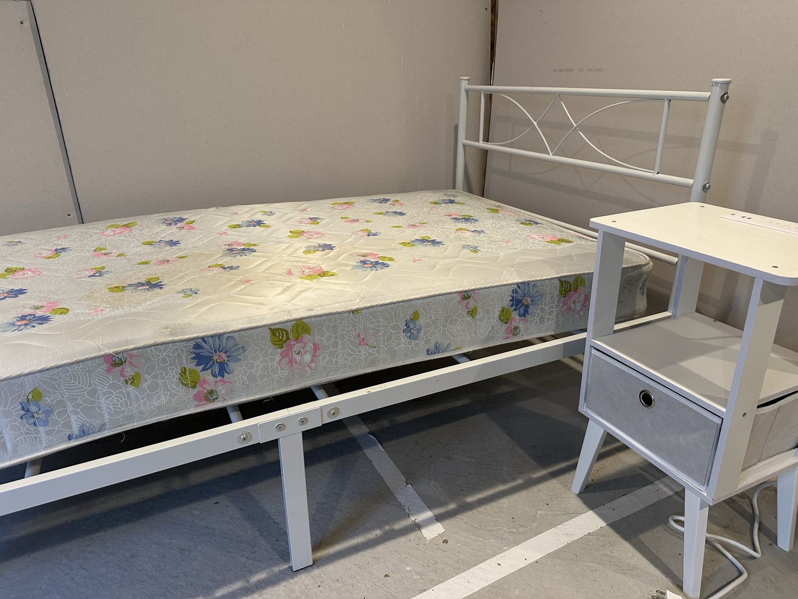 White Metal Twin Bed Frame with Floral Mattress and nightstand 